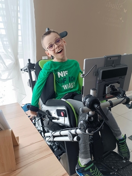 Photo: Liam and his eye gazing computer